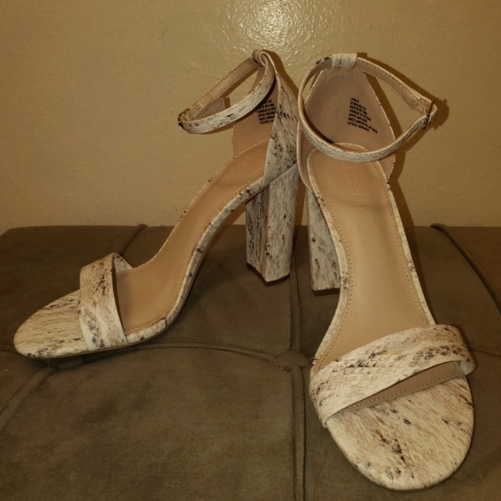 Faux snake skin pumps